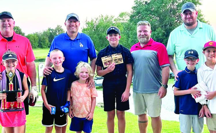The Columbus Junior Golf Program hosted a Youth/Adult Scramble format tournament with 20 teams, competing for trophies and prizes. Winners in the B Flight were Sophia and Larry McReynolds. Bode and Jacob Saiz took third place as brother Cal cheered them on. Easton and Nathan Long finished in fourth place and Kamden, Kasen, Adam Sallee placed second. The tournament was held August 10 at the Brush Creek Golf Course to close out the Junior Golf Program’s season. Courtesy Photo.