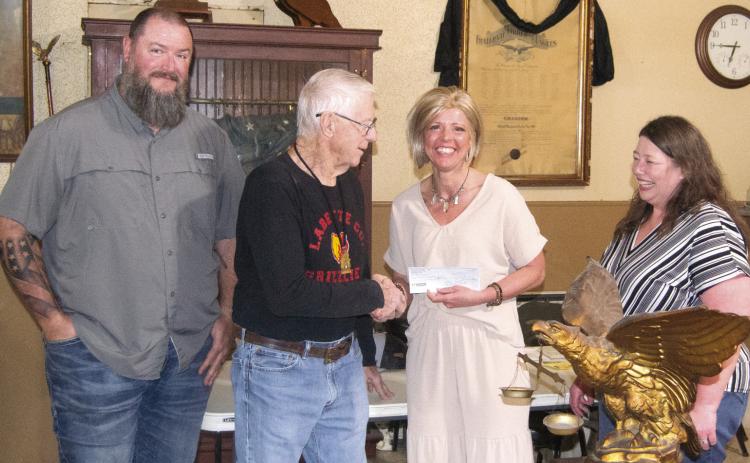Members of the West Mineral Eagles presented Joplin Ronald McDonald House Executive Director Lori Jones with a donation check raised by the Eagles as well as several pounds of aluminum pull tabs. Presenting the check were Jim Wilson, Robert Beal, Director Jones and Crystal Beal. Jones indicated the check made her trip from Joplin worthwhile.