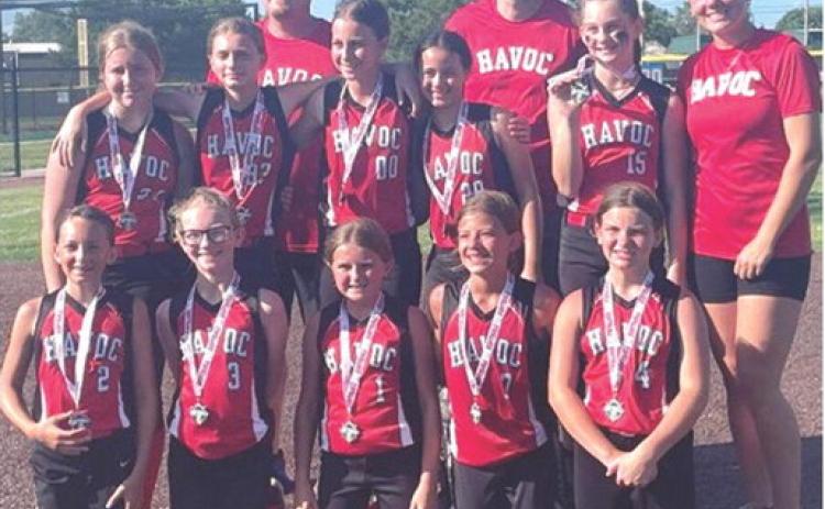 A Columbus Girls Softball Team, the Havoc, took second place in a one-day tournament Saturday in Chanute. The girls played four games and received medals for their runner-up finish in the 12U division. Team members are front row: Olivia Dainty, Reagan Holmes, Gracyn Carter, Lakynn Burton, and Alaina Smiley. Back row: Evelyn Smith, Paizley Buergin, Kinsley Hess, Kayelynn Adoremos, and Brynlee Schalk. Coaches for the team are: Donny Carter, Steven Burton, and Katie Simpson. Courtesy photo.