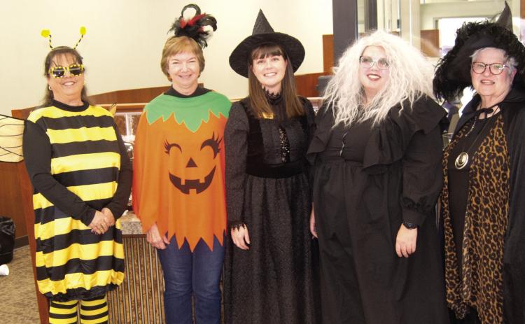 When Halloween coincides with Customer Appreciation Day, its a good time to dress up. Sonja Duley, Janette Crain, Melissa Carroll, Heidi Smorstad and Patty Dunnic were a festive crew.