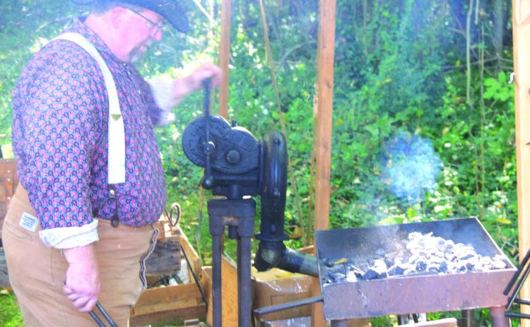It was not uncommon for blacksmiths to accompany the army into battle as they made parts for guns, knives, swords, and other metal items for soldiers and encampments. During the recent re-enactment in Baxter Springs of Quantrill’s raid on Fort Blair Jim Friend, of Grove, Oklahoma brought his portable blacksmith shop to the battle site.
