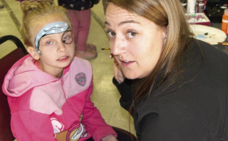 Gracie Eisenhour was getting her face painted by Michelle McCormick during the Family Fall Festival in Scammon on Saturday. It was an afternoon of fun, food and entertainment.