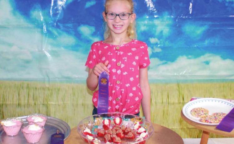 Reagan Holmes, Spring Valley Sparklers, received purple ribbons for each of her entries into the Foods competition for the Cherokee County Fair.