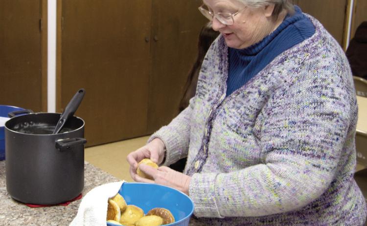 Gretchen Sassenrath had biscuits and gravy at the Agronomy Breakfast before speaking.