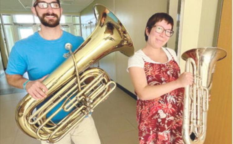 Members of the Pittsburg Community Orchestra include Jake Letner and wife Sean Gilmore. They performed yesterday and will be performing additional concerts in the future. Courtesy photo.