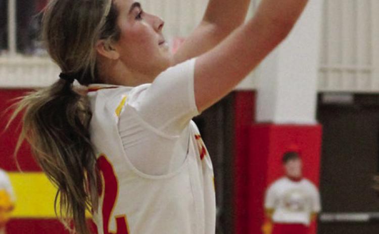 Lady Titan Senior, Ava Harman, shots from the threepoint line in the 59-40 win over College Heights in the MOKAN Tournament, Friday, at the CUHS Gym.