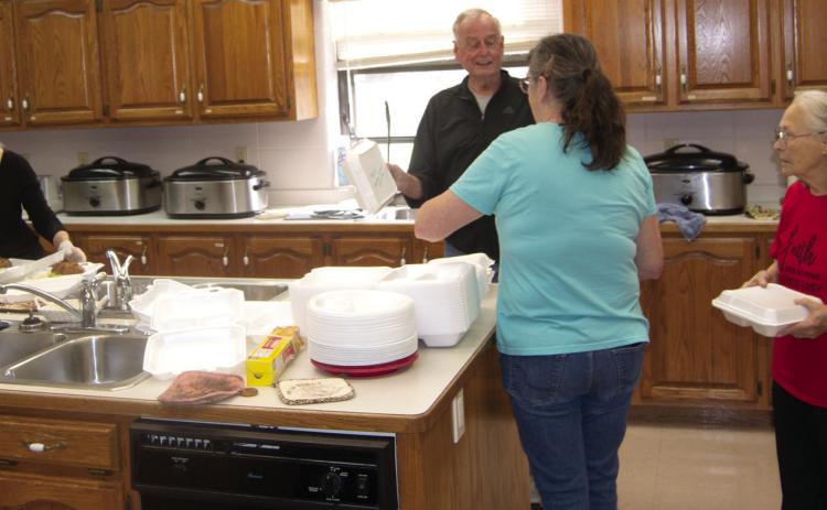 Members of the Baxter Springs Methodist Church recently held a baked potato bar fundraiser. The event drew a large amount of customers.