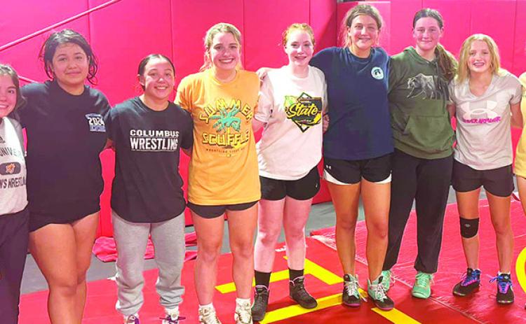 Alumni attend open mat session