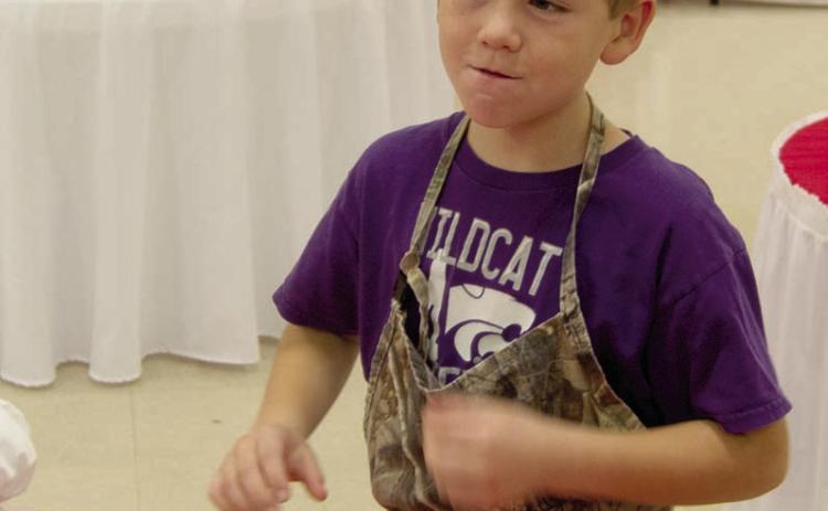 Colton Holden was checking the candy samples at the St. Bridget’s Cookie Walk on Saturday. A large early crowd took away pounds and pounds of cookies and candy made by the members of the Altar Society.