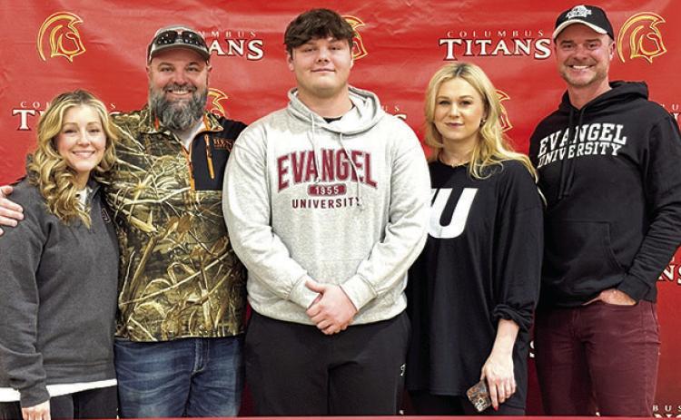 Titan Senior, Carter Henry, has signed a National Letter of Intent to continue his football career at the college level with Evangel University. Carter was joined by his parents Elizabeth and Chad Henry and Andrea and Jim Gaither and his family during a signing day held at the CUHS Gym, Friday.
