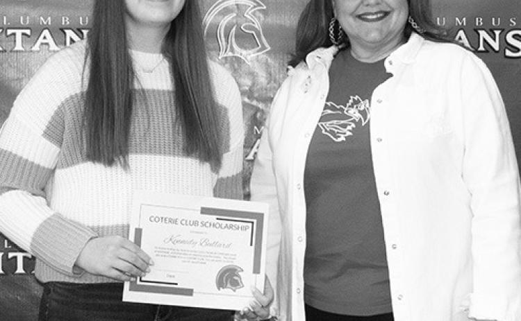 Kennedy Bullard received a $100 Coterie Scholarship during the Senior Assembly at the Columbus Unified High School Gymnasium, May 19. Rebecca Stone, Coffeyville Community College, Columbus Campus, presented the award.