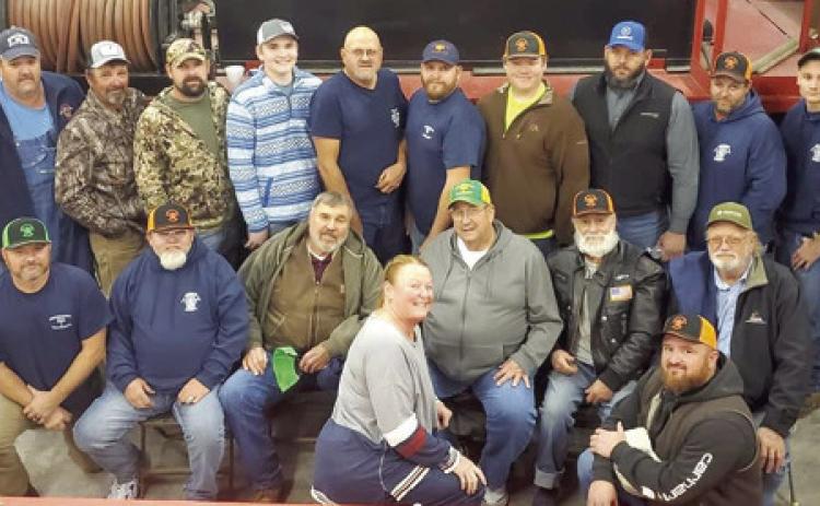 In addition to celebrating the Christmas season, members of the Lola Township Volunteer Fire Department celebrated a milestone for their organization. It has been 10 years since the department was formed. The members spend countless hours training and working to become even more efficient in their roles as public servants. Courtesy photo.
