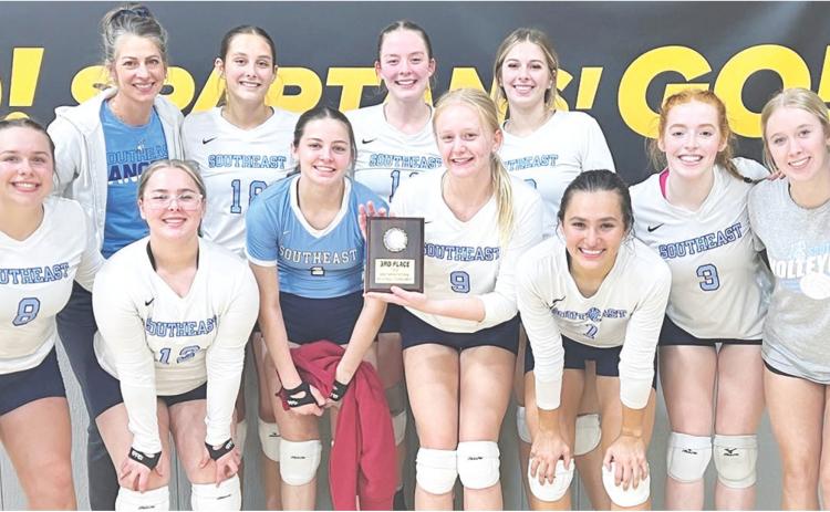 The Southeast Lady Lancer Volleyball Team placed third in the Dexter, Mo. Tournament, Saturday. The team had many games to hone their skills and improved to a 6-7 record. Team me_ sophomore, Camryn Sanders_ sophomore, Sienna Collins, junior, Maizy Williams, and Head Coach Maya s* — ■ . _ . . White. Courtesy photo.