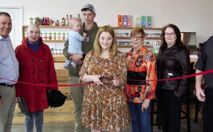 Community welcomes new business with ribbon cutting