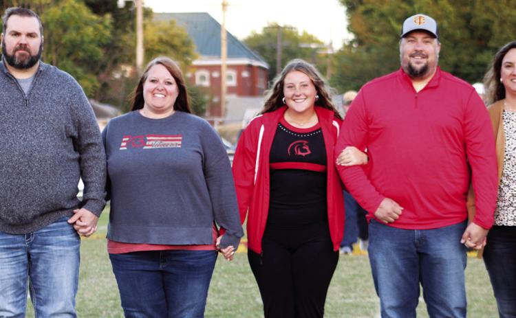 Lady Titan Senior, Taryn Billings, was recognized on Senior Night, October 13, at Titan Stadium. Taryn is a two-year member of the Titan Soccer Team and a four-year member of the Titan Band. She was escorted by her parents, Amy Butterworth and Deke Schultz and Bryson and Kendra Billings.