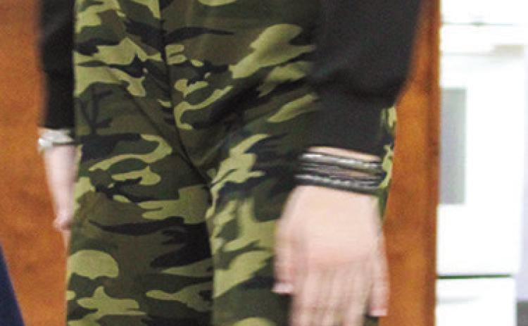 Sophie Elmore displayed her camo themed outfit at the annual 4-H Style Revue Saturday, June 27 at the Extension office in Columbus.