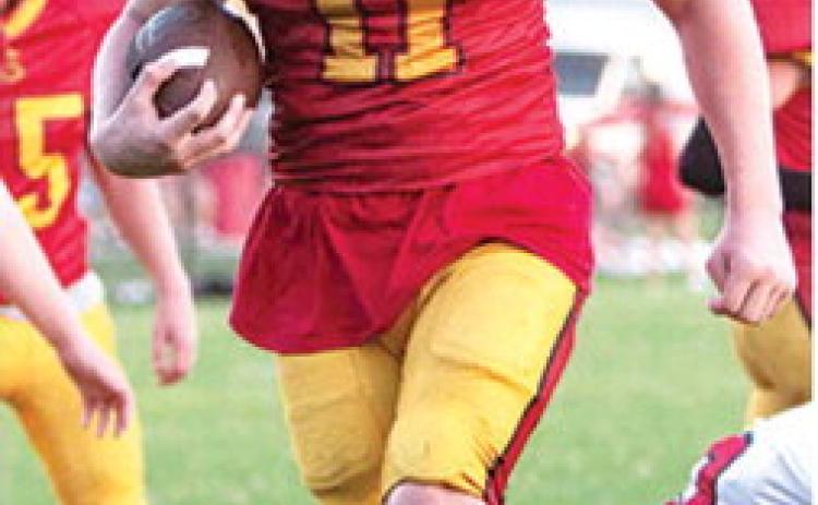Wyatt Linn, Titan Eighth Grader, ran in two, 2-point conversions and a five-yard touchdown in the Columbus Junior High win, 16-6, over Baxter Springs, September 17, at Titan Stadium. Photo by Kristin Sharp.