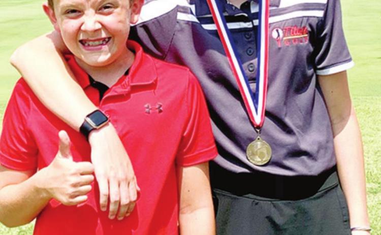 Lady Titan Kansas Junior Golfers, Mallory Thompson and Reese Grundy earned top medalist and runner-up in their respective age divisions at Wellington, Wednesday. Courtesy Photo.