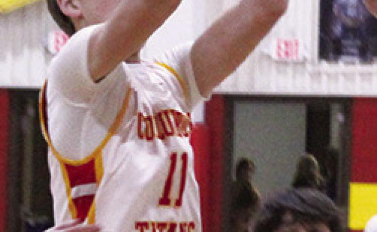 Jonas Stover scored six points including this jumper in the 8A, 18-55, season opening, loss to College Heights Christian School, Tuesday, at the Columbus High School Gym.
