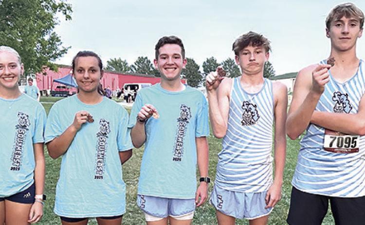 The Southeast Cross Country Team had seven runners medal in the Girard Invitational Meet, Thursday at the Greenbush Course. Medalists are: Journee Rimmer, junior; Kendyl Renn, senior; Jackie Robinson, junior; Hudson Locke, junior; Chris Archey, sophomore; Zayne Gabern, senior; and Tucker Sutton, sophomore. Complete results can be found on page 7 of today’s edition of the News-Report. Courtesy photo.