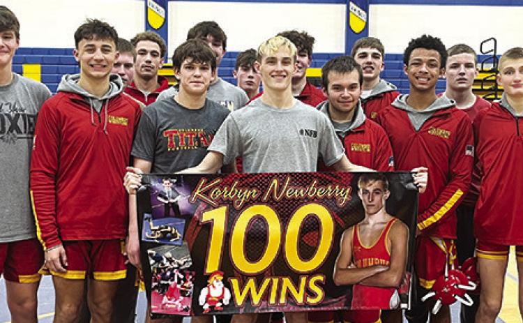 Newberry hits 100 wins, Titans sweep Parsons dual