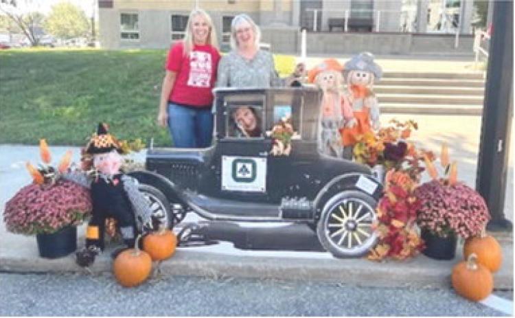 In a tie for third place, Security 1st Title created their scarecrow scene around a classic car. Courtesy photos.