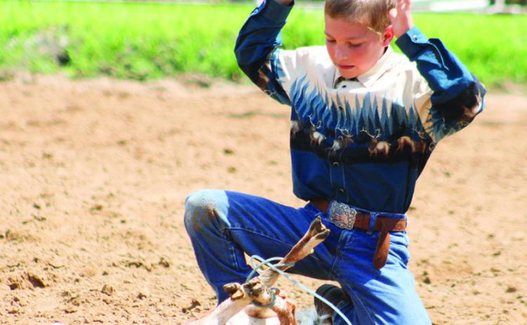 During the Cherokee County Horse Show Saturday, July 12, Samuel King was one of the competitors in the ages 10-13 Goat Tying class.