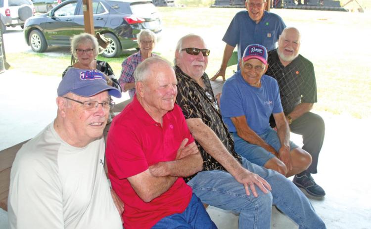 During the West Mineral all school reunion held Saturday at Big Brutus Park six members of the West Mineral Class of 1956 were visiting together. The class members included with their current residence Lynn Turner, Wichita; John White, Columbus; John Battitori, Girard; Ed Vanderbeck, Cherokee; Bob Grant, Scammon; Paul Bennett, Ozark, Missouri. Also sitting behind the classmates are spouses Linda Grant and Mary Bennett.
