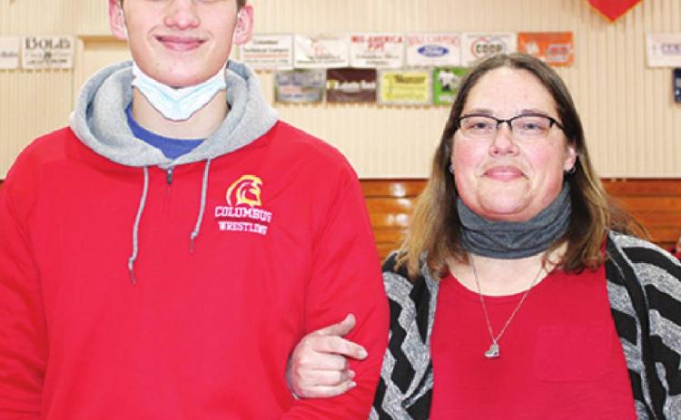 Titan Senior Osmosis Jones was recognized Friday night at the Wrestling Senior Night Ceremony in the CUHS Gymnasium. Osmosis is a four-year member of the Titan Wrestling Team. He was escorted by his mother, Crystal Ash.