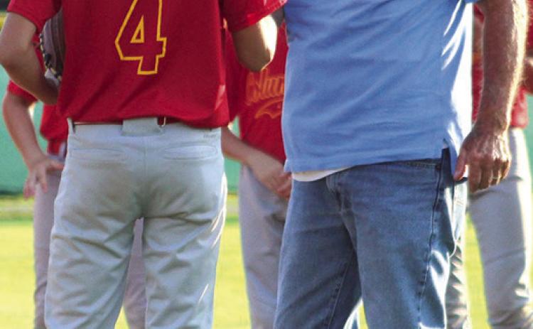 Commissioner tosses first pitch