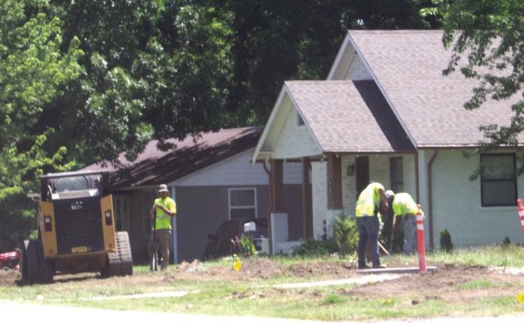 Workers continue progress on the Safe Route to School sidewalk replacement program. The grant helps build new sidewalks. The Maple Street project and East town project are currently underway. Wednesday water service in West town was disrupted due to the contractor striking a water line.
