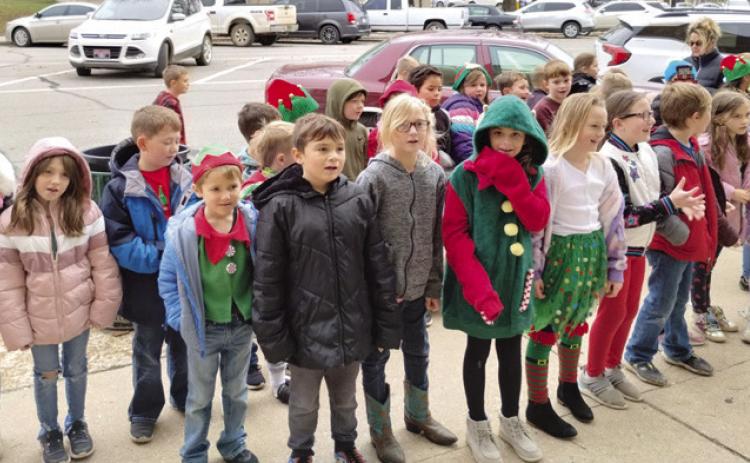 Melodies of Christmas filled the air in downtown Columbus Monday
