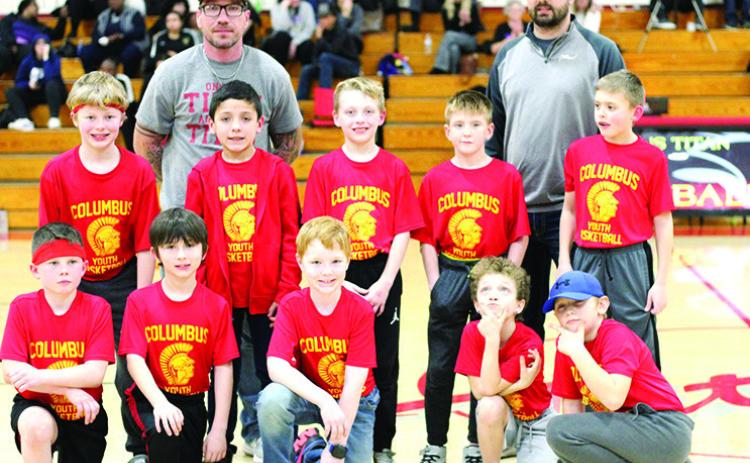 The Columbus Recreation Fourth Grade Boys Basketball Team was introduced during the halftime of the Titan Varsity Boys game against Coffeyville at the CUHS Gymnasium in February. Team members are front row: Mason Worden, Hunter Davis, Beckett Sauerwein, Tucker Siemer, and Cruz Sharp. Back row: Eamon Wilkins, Lucas Haviland, Bode Saiz, Braxton Hayes, and Jaxon Harper. The team is coached by Matt Haviland and Hazen Hale.