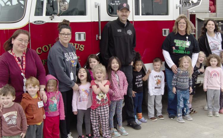 The Head Start students at the Virginia Crossland day care center received a special treat from the Columbus Fire Department recently as the fire fighters read to the youngsters and took them on a tour of the big fire truck.