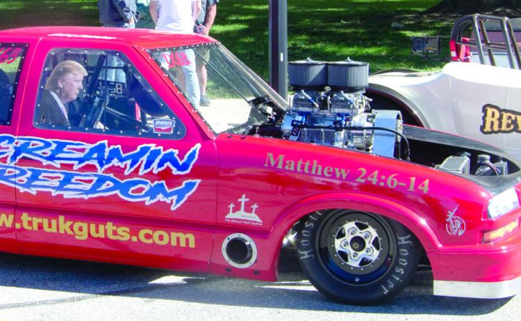 Scott Draeger brought Screamin Freedom, an S10, 535 BBC an IHRA World finalist in 2022. He also brought Bonnie’s Revenge, 1927 Ford Roadster 468 BBC that has raced in the Nostalgia Race Series. Draeger also brought a 1971 GMC Sierra in memory of Rick Draeger. Rick Draeger purchased the GMC new and after an ownership change or two (still within the Draeger family) the truck now is a part of Scott’s classic car collection. Below Scott Draeger brought his vehicles to Columbus in this trailer set up.
