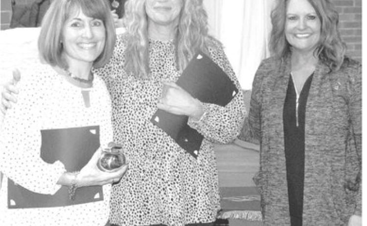 The Golden Apple Award is presented to an instructor in pre-kindergarter through sixth grade and seventh grade through twelfth grade, plus Coffeyvilk Community College, Columbus campus, in the USD 493 District. Previous Golden Apple nominees in the elementary school included Suzette Henderson anc Stephanie Evans. Kari Soper (right) Coffeyville Community College Columbus Campus director, presented the Golden Apple to Henderson.