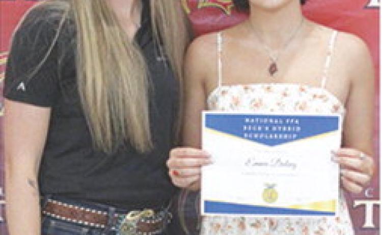 Emma Duling received a National FFA Beck’s Hybrids Scholarship in the amount of $2,000 from representative Cailynn Fedorkowicz during the May 16 Senior Assembly at the CUHS Gymnasium.