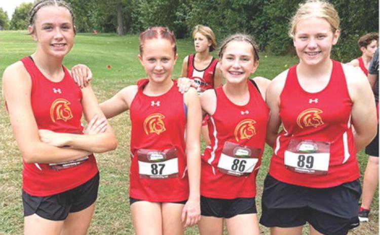 The Columbus Junior High Lady Titan Cross Country Team competed at the Oswego Meet, September 18 at the Oswego Golf Course. Racing for the eighth grade girls team were Sammi Ohmart, first; Hieyla Shelton, fifth; Cora Rider, fourth; and Lydia Wilkins, ninth. The team will host a junior high meet, Tuesday, at the Brush Creek Golf Course in Columbus. The junior high race begins at 3 p.m. Courtesy photo.