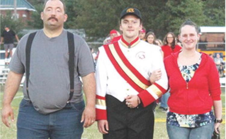 Senior, Gabe Edwards, was recognized during Senior Night Ceremonies at Titan Stadium, October 17. Gabe is a four-year member of the Titan Band. He was escorted by his parents Matthew Edwards and Sarah Sattazahn.