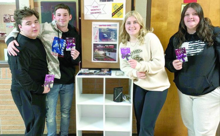 Seatbelts Are For Everyone (SAFE) program encourages students to wear their seatbelts. Each month, there is a drawing for those who completed pledge cards. At Columbus High School, drawing winners included Charles Sharp, River Sargent, Emily Benedict and Andrea Hutto. Courtesy photo.