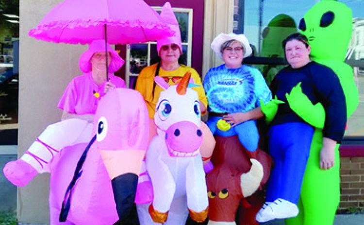Business owners and residents in Columbus may have seen a colorful sight Tuesday afternoon. A cheerful crew from Autumn Place made the rounds from their facility all the way to the Square greeting those they came in contact with. The crew consisting of Connie Bennett, Cathy Swathwood, Jami Audo and Tammy Lloyd were celebrating Assisted Living Week throughout town.