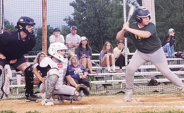 The Columbus Cal Ripken Major Leaguers were on the field between rains and storm warnings to get in this game between the VFW and Vital Signs, Tuesday. Vital Signs came away with the win, 3-0. Batting for the VFW is Cole Atkinson with Cord Saporito catching and Brett Hamilton umpiring. The Major League Division plays on Volunteer Field, Tuesday and Thursday nights. (Photo courtesy of Clint Saporito.)