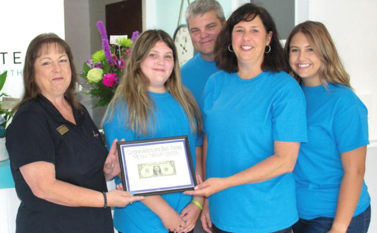 Ribbon cutting held at The MAX Therapy
