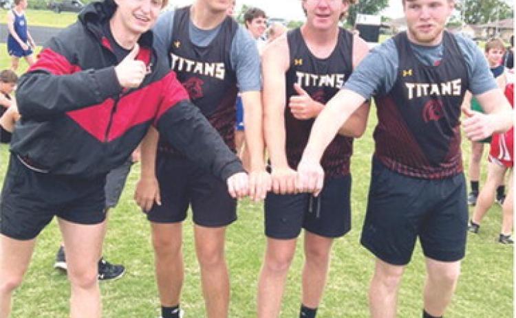 Titan Junior, Gavin DePratt and seniors, Jonah Smith, Kyler Rahmeier, and Brandon Stice stepped out of the field and onto the track to take first place with a time of 50.6 seconds in the 400 Meter Throwers Relay at the Northeast High School Track and Field Meet, Tuesday, in Arma. The CUHS Athletes normally compete in field events but took to the track for the special race specifically for them. Complete results can be found on page 7 of today’s News-Report. Courtesy photo.