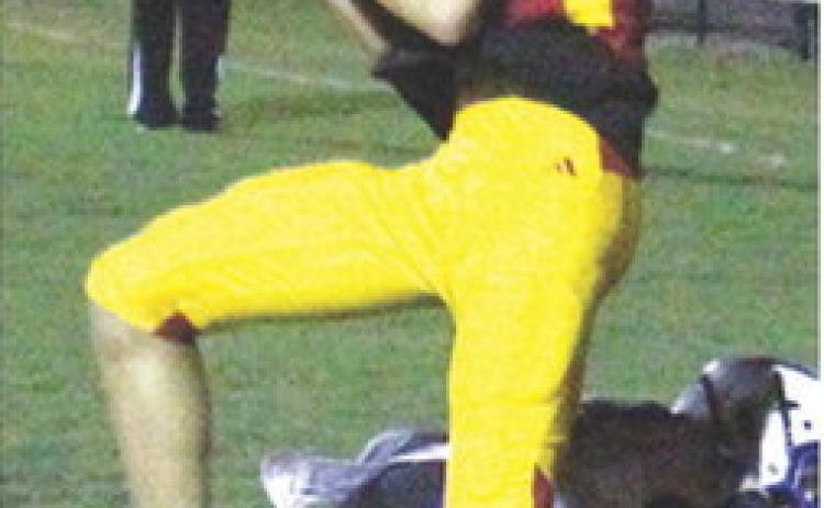 Titan Sophomore, Jonas Stover, came down with one of his three pass receptions in the end zone for the lone touchdown for Columbus in the 7-20 homecoming loss to Neodesha, Friday, at Titan Stadium. Senior, Jett Tanner, threw the pass from eight yards out.