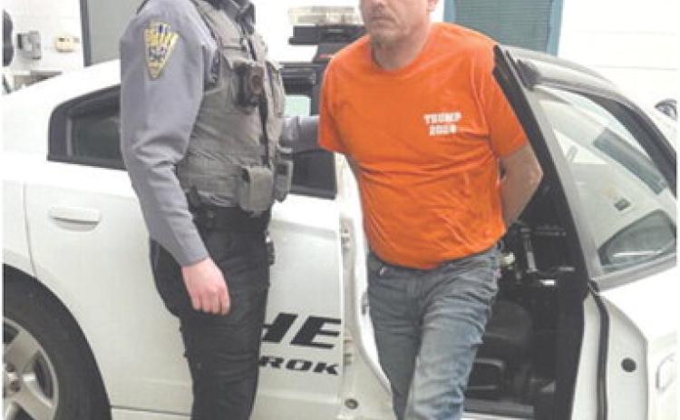 Sheriff’s Deputy Evan Duckett escorts Brian Stewart into the Cherokee County Jail after Stewart was found guilty of sex crimes.