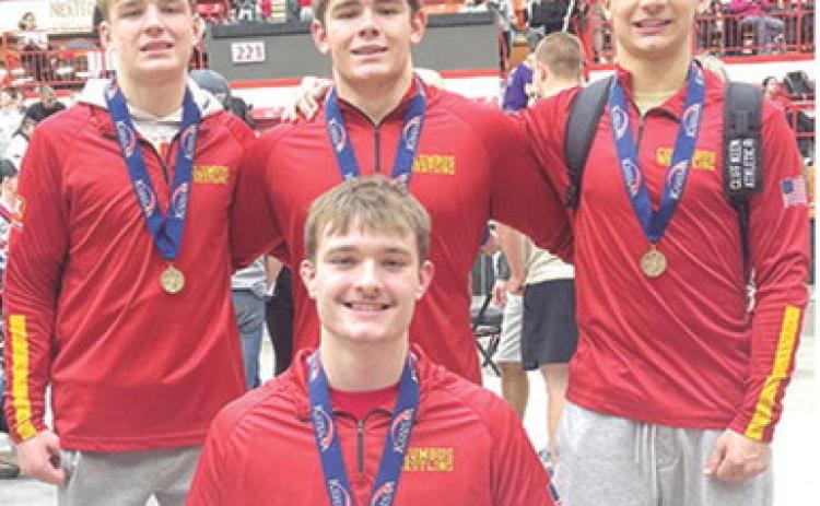 Four Titans placed in the top six at the Kansas Boys Class 4A State Wrestling Championship Tournament to help the Columbus Team to a sixth place team finish. Junior, Mason O’Banion, (front) is the first state champion for the Titans in 11 seasons. Sophomore, Chase Pelt placed sixth, sophomore, Kash Smith was second, and senior, Jayden Rodriguez finished in fifth place at the season finale. Photo by Nate Jones.