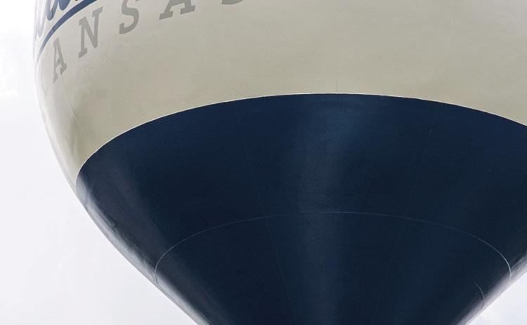 Workmen were finishing the work on the water tower in Columbus City Park. The iconic ships have been replaced with the city’s official logo. The decision for the change was made at the April 6 Columbus City Council meeting.