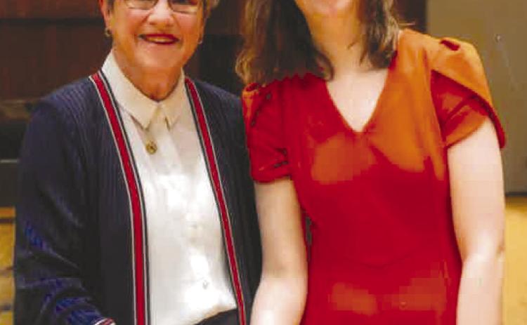 Kansas Governor Laura Kelly congratulates Riverton High School graduate Bethany Hilderbrand on being a 2025 Kansas Governror’s Scholar. Courtesy photo.