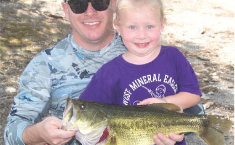 Kaydence Babcock shows the winner of the “Big Fish” catch at Saturday’s Cherokee County Sportsman’s annual fishing contest. The 4.96 pound bass was taken from a strip pit. Kaydence also had a 4.22 pound bass and she brought in 14.58 pounds of bass in just a couple of hours fishing.